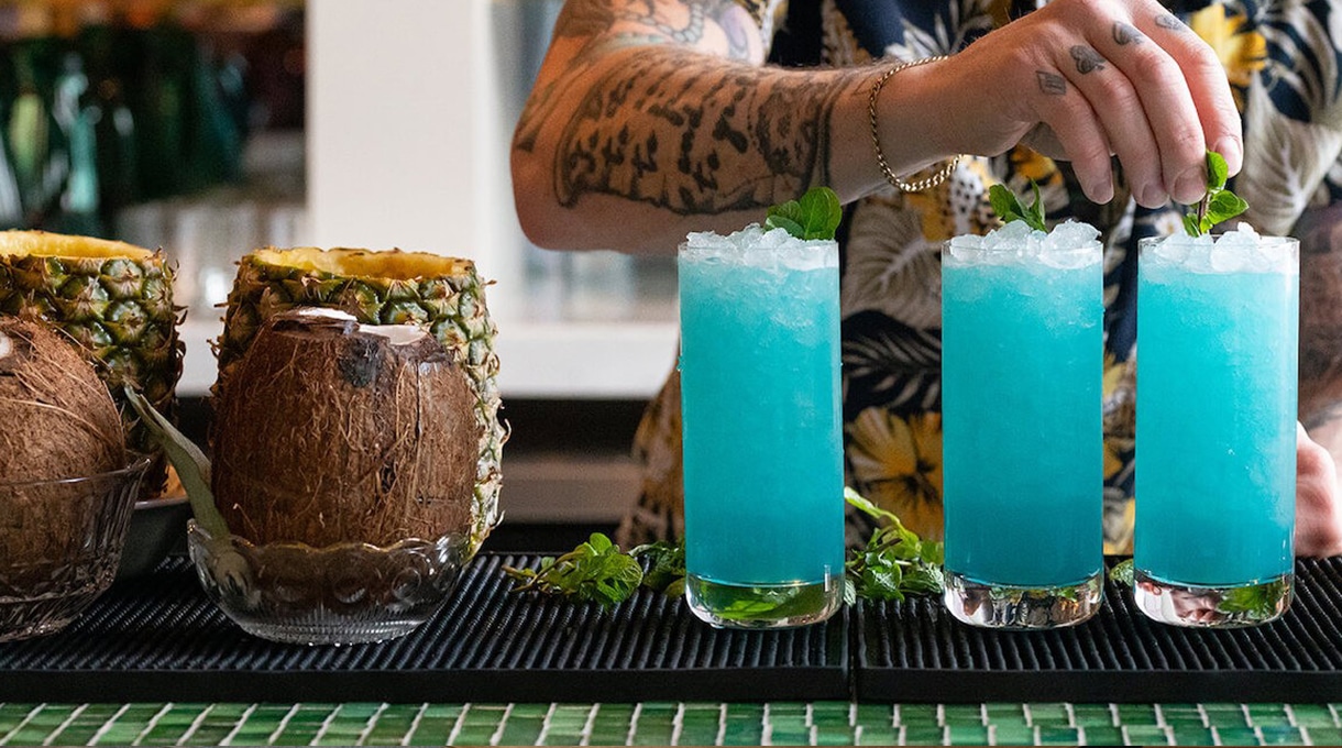 Blue coloured cocktails on the bar at Bar Sofia
