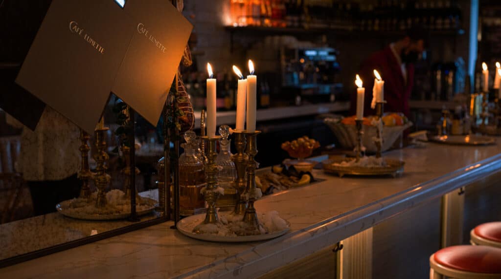 Candles sitting on the bar at Cafe Lunette