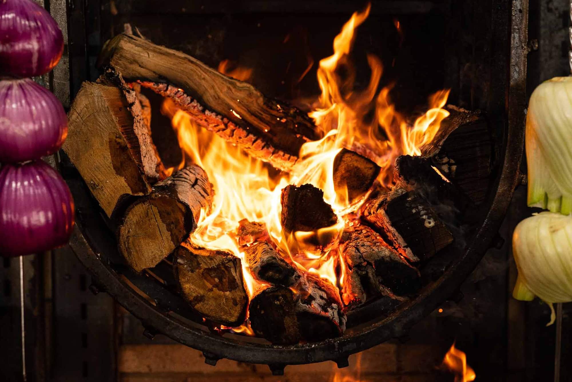 open fire cooking at salt + ash halifax